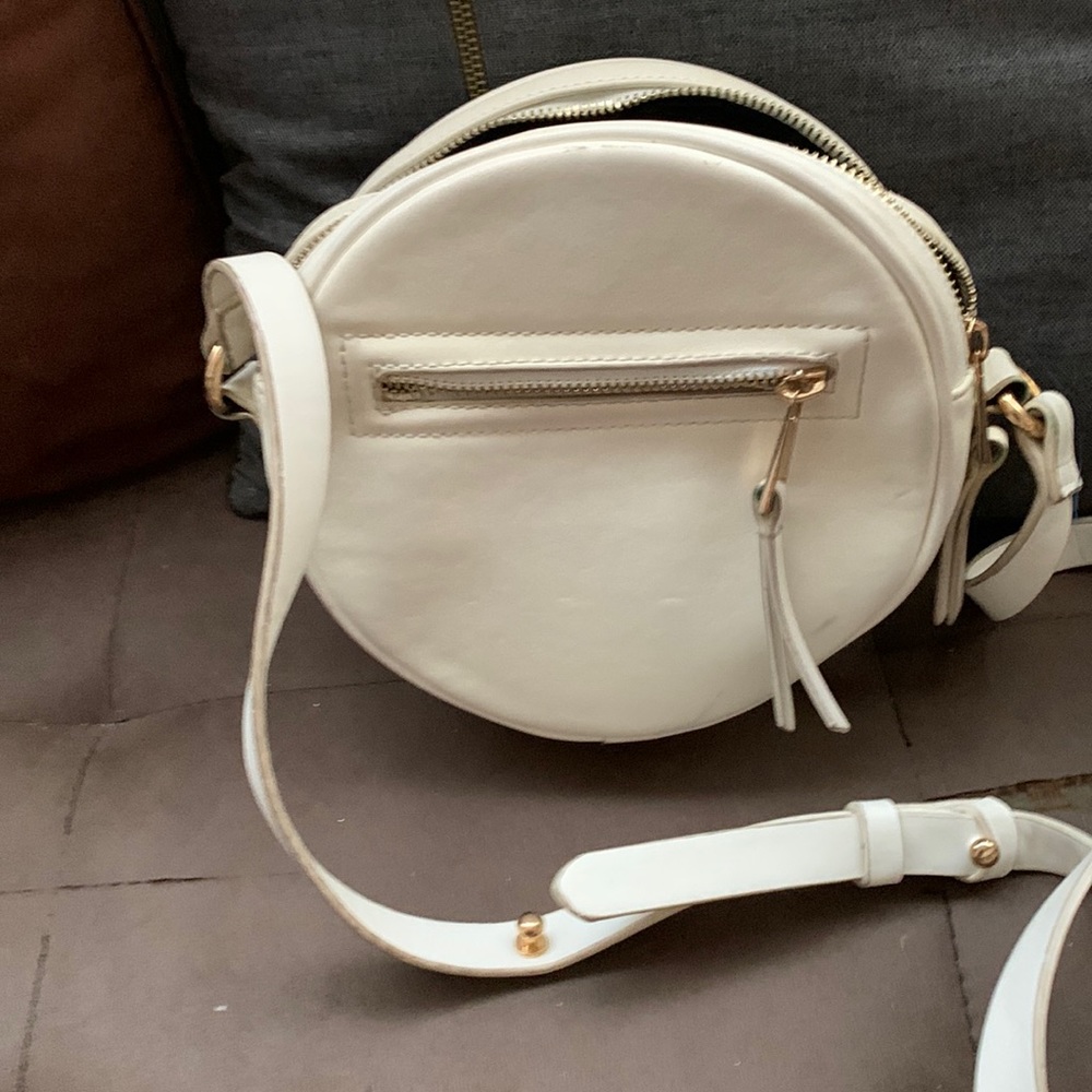 Here’s a nice white Ron’s pocketbook made by forever 21